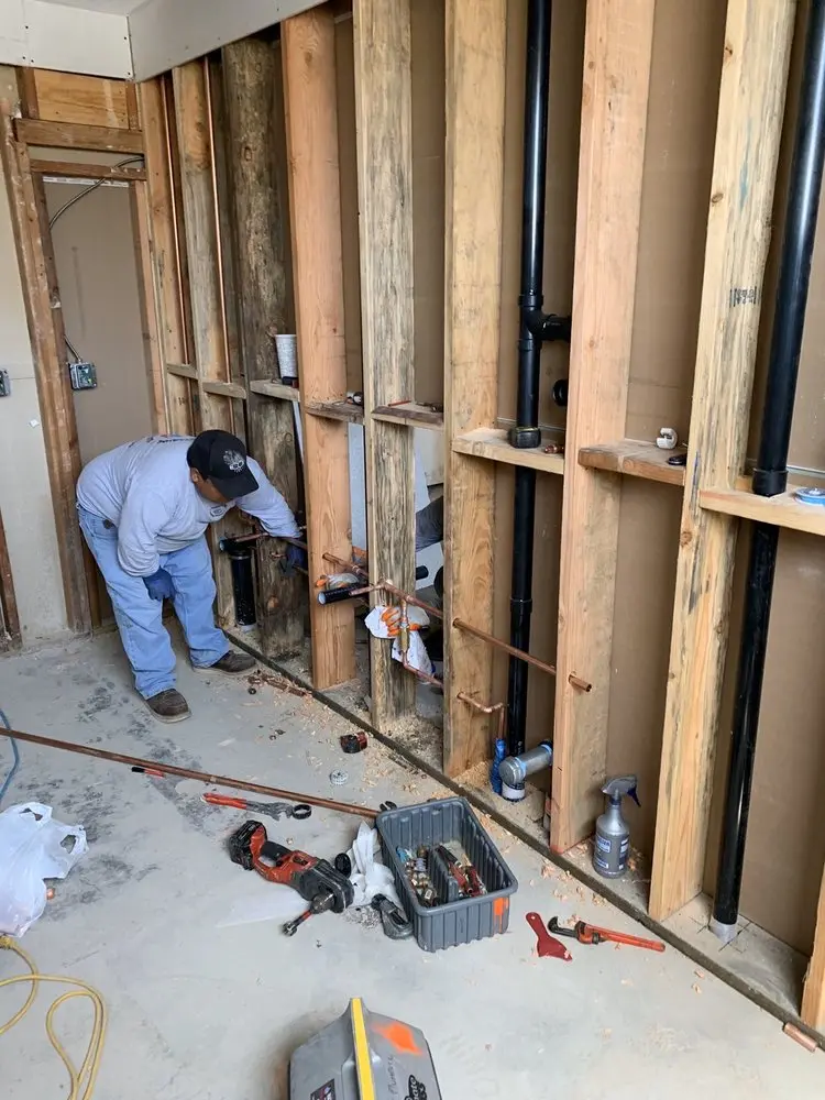 Commercial rough-in plumbing for Water Heater Replacement in Peachtree Station